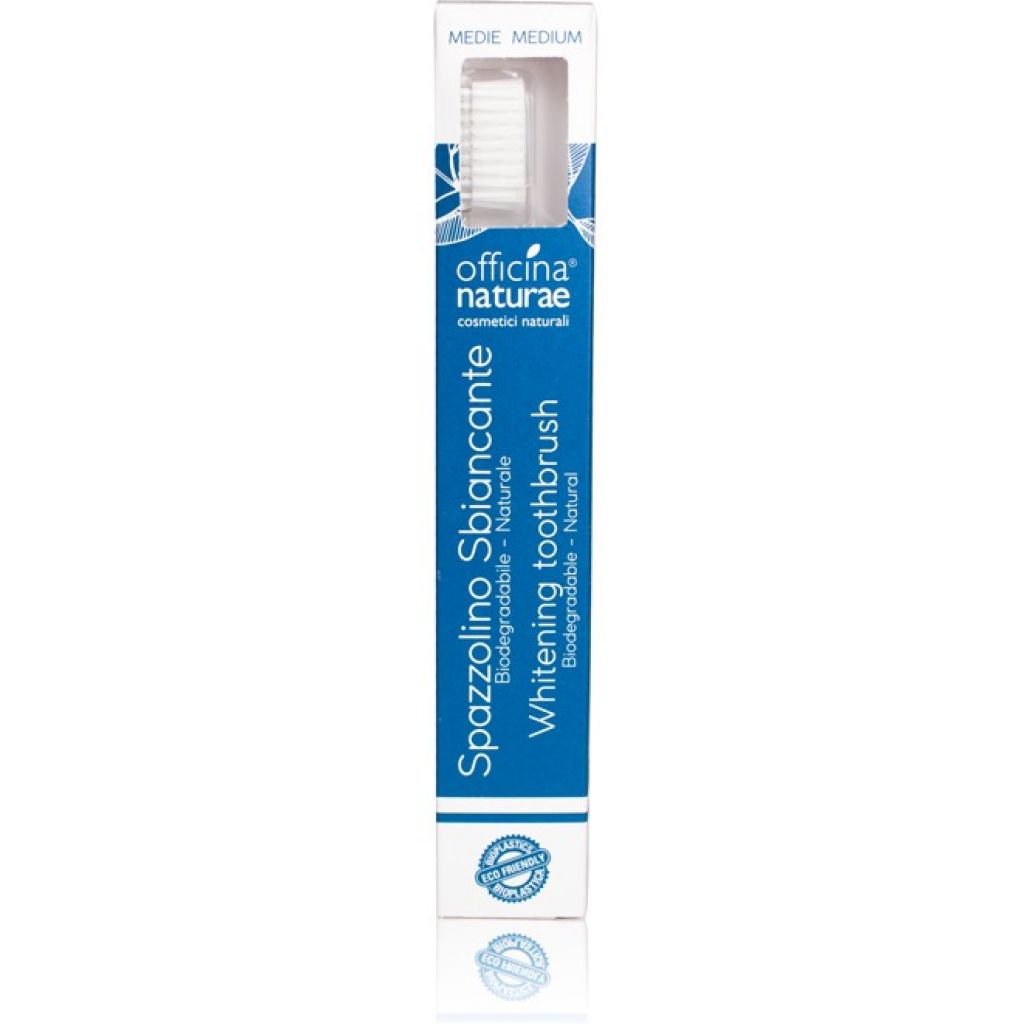 Whitening toothbrush with calcium carbonate bristles